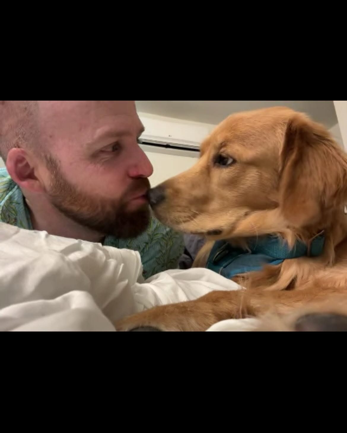 Jordan touching noses with Rosie