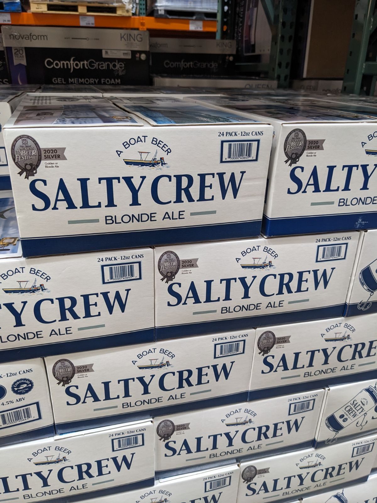 Cases of Salty Crew Blonde Ale beer stacked at a warehouse store